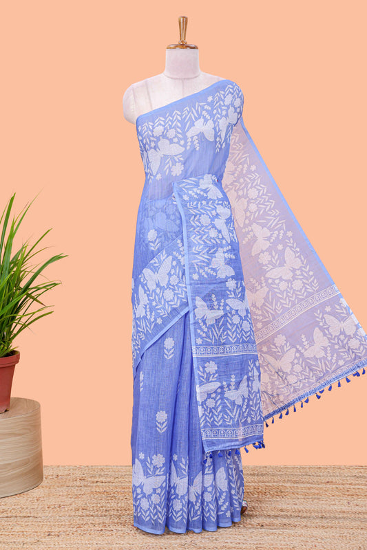 Blue linen cotton saree with floral buttas and butterfly motifs border, Printed self pallu and blouse