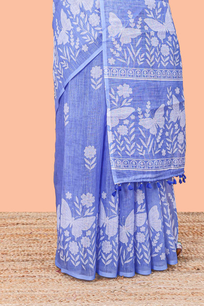 Blue linen cotton saree with floral buttas and butterfly motifs border, Printed self pallu and blouse