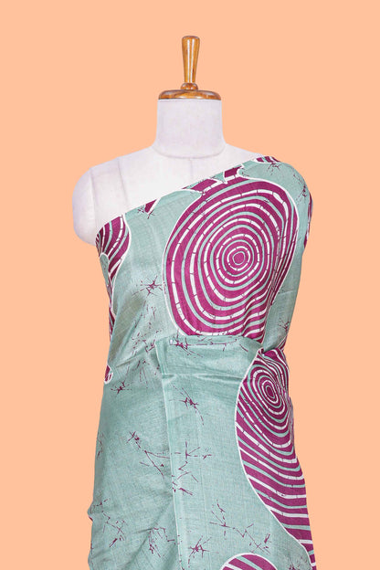 Green khadi cotton saree with adire batik print on body and pallu with matching blouse