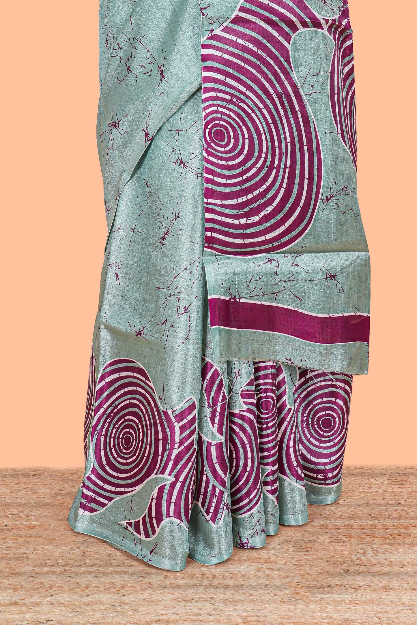 Green khadi cotton saree with adire batik print on body and pallu with matching blouse
