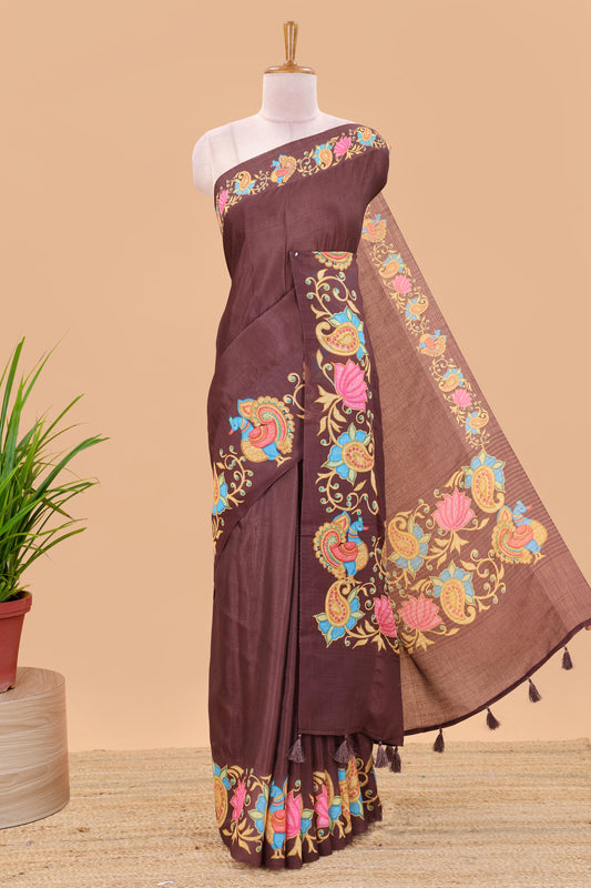 Brown tanjore painting style linen tussar saree with peacock & lotus motifs and printed pallu