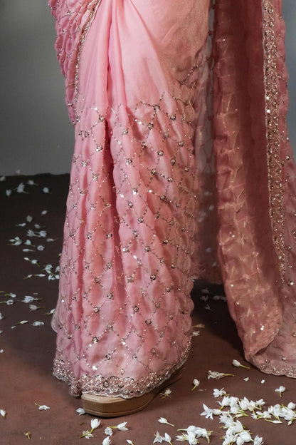 Peach geometric pattern stone work all over body designer saree with scallop design border matching blouse