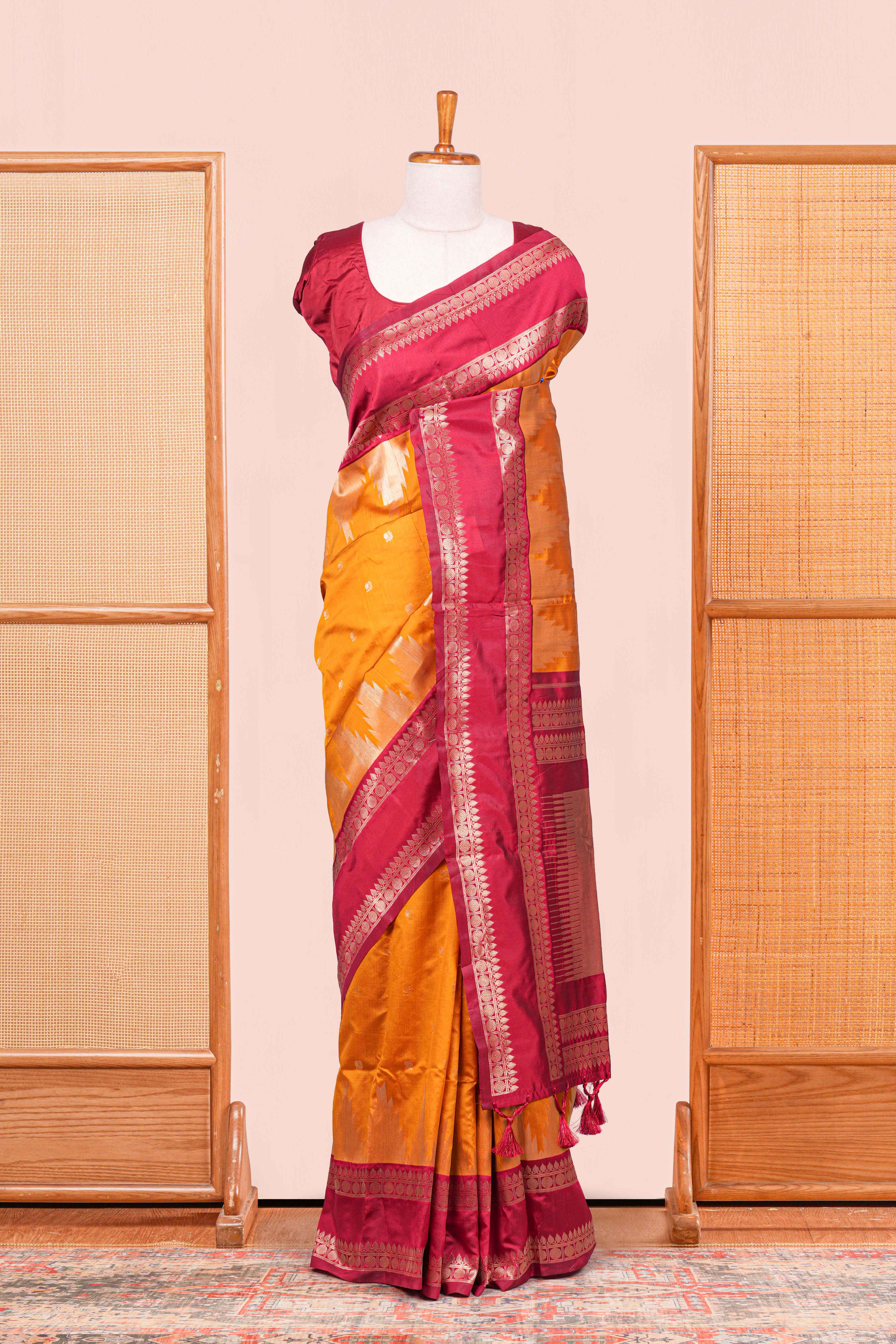 Mustard Yellow Semi Art Silk Saree Golden Zari Motifs Along With Thalampoo Zari Woven Across The Body And Rich Golden Zari Pallu
