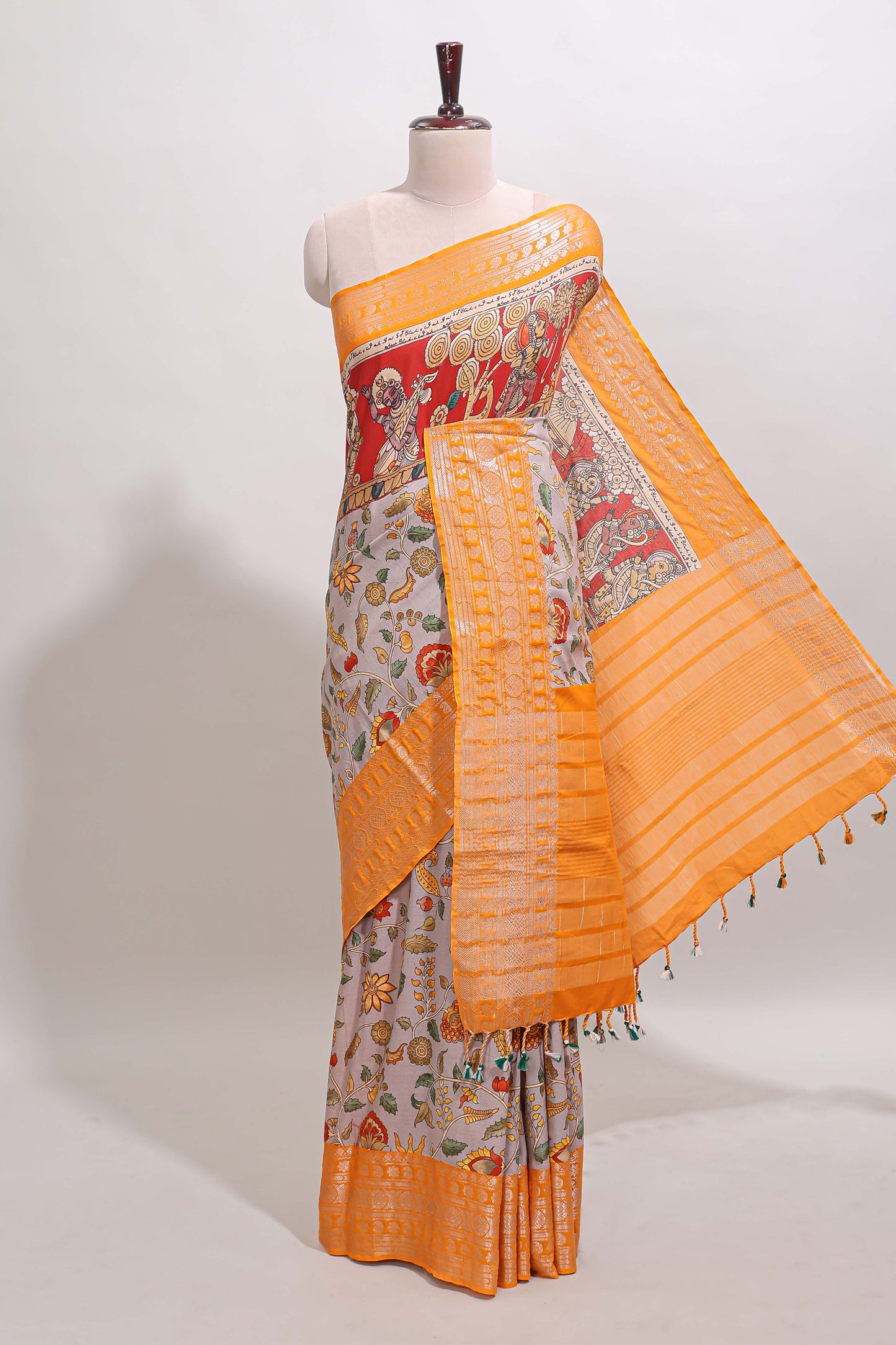 Grey kalamkari style chirala cotton saree with contrast zari border, striped pallu and printed blouse