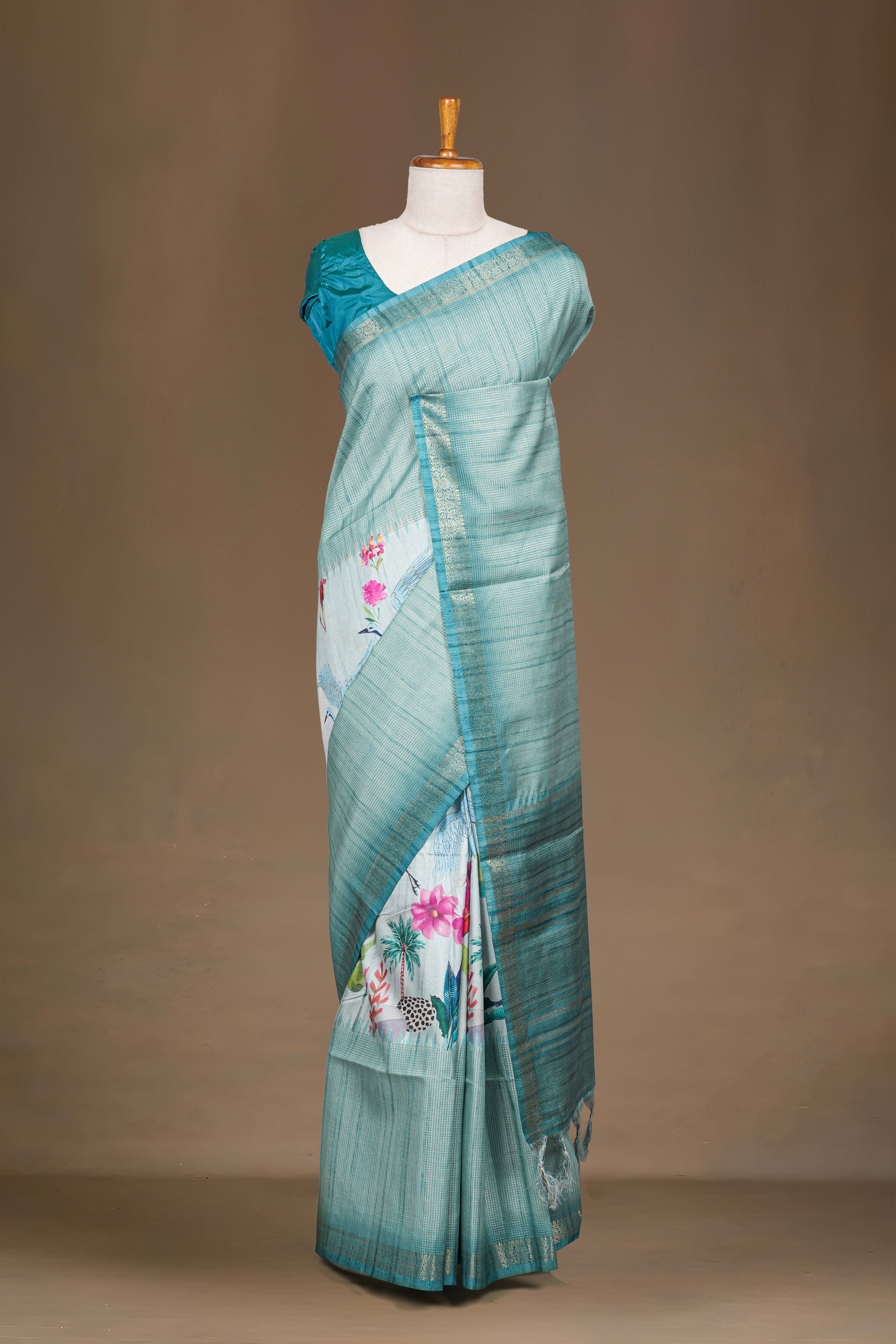 Teal Blue Art Tussar Saree Centre Floral Print Across The Body With Zari Stripes Pallu