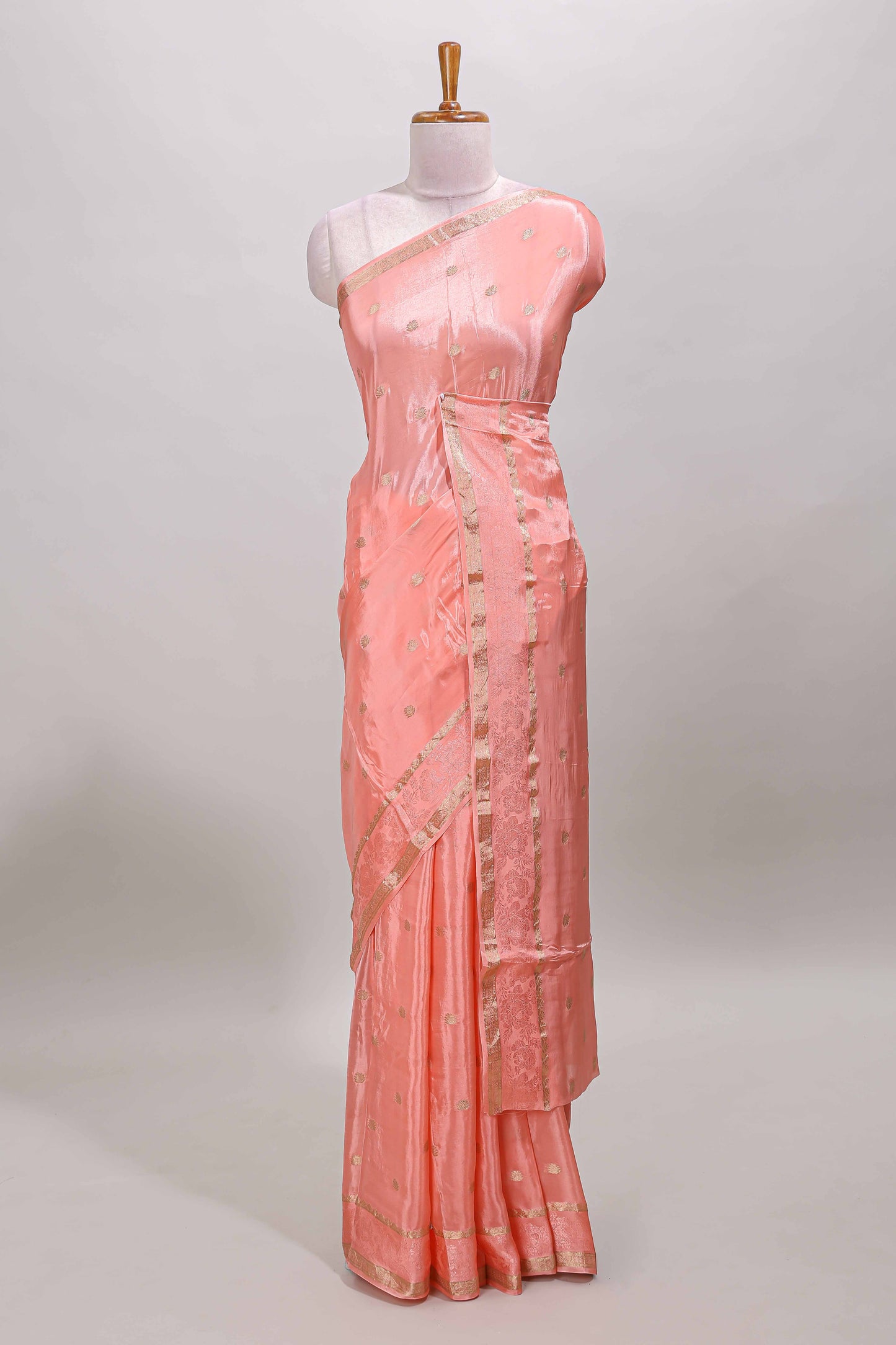 Peach zari butta dola silk saree with self zari border and matching blouse