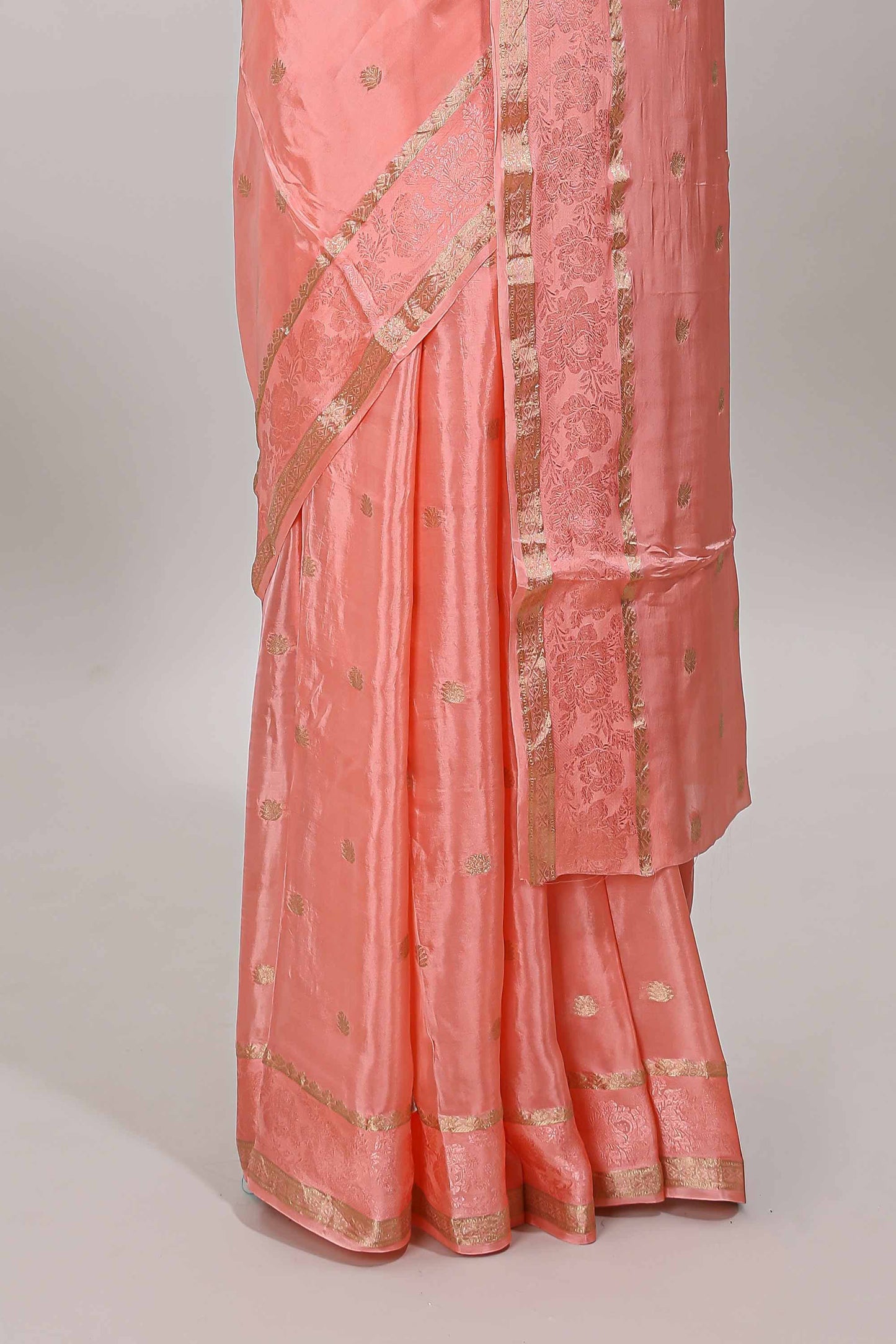 Peach zari butta dola silk saree with self zari border and matching blouse
