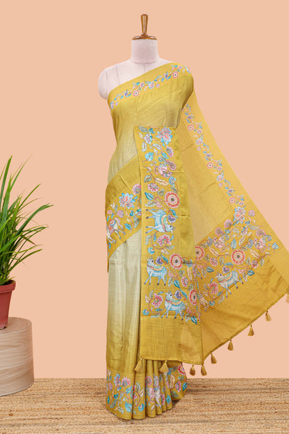 Lemon yellow linen tussar kalamkari style saree with animal floral border and pallu