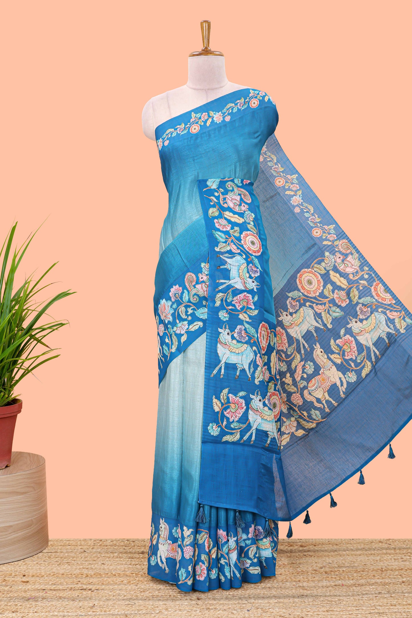Blue linen tussar saree with kalamkari print, animal and floral motif pallu