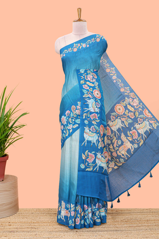 Blue linen tussar saree with kalamkari print, animal and floral motif pallu