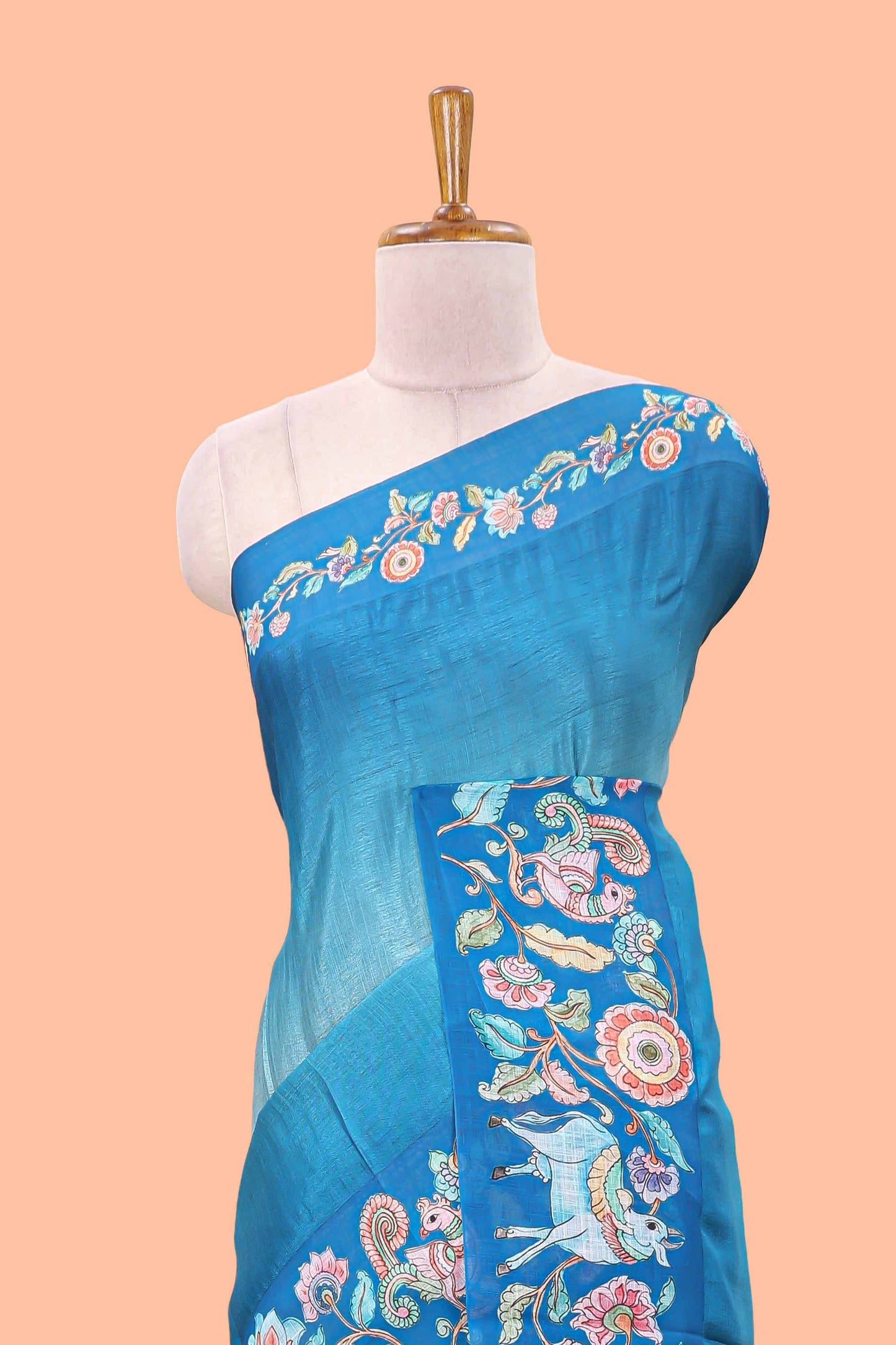 Blue linen tussar saree with kalamkari print, animal and floral motif pallu