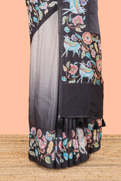 Black linen tussar saree with kalamkari print, animal and floral motif pallu