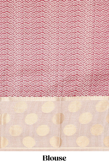 Maroon art tussar saree with plain body, cream coin motif zari border and zig-zag printed pallu