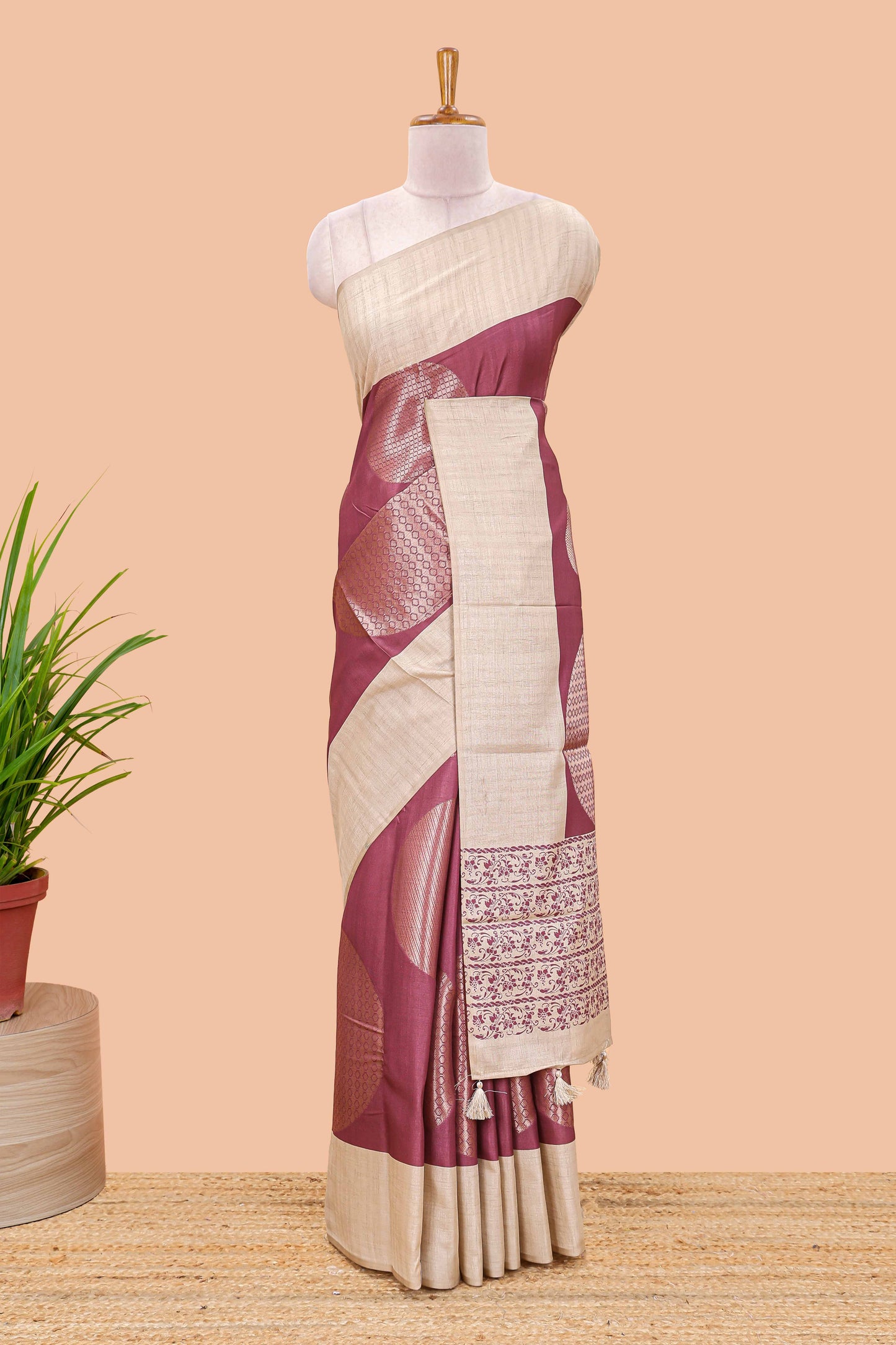 Maroon art tussar saree with large circular zari buttas and contrast cream floral pallu