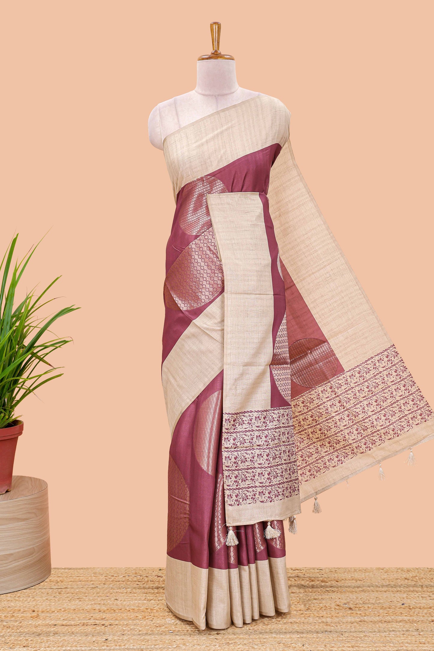 Maroon art tussar saree with large circular zari buttas and contrast cream floral pallu