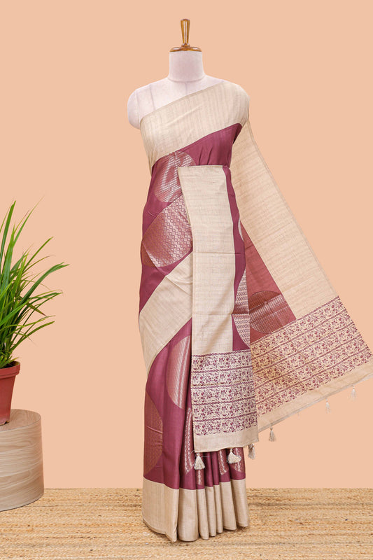 Maroon art tussar saree with large circular zari buttas and contrast cream floral pallu