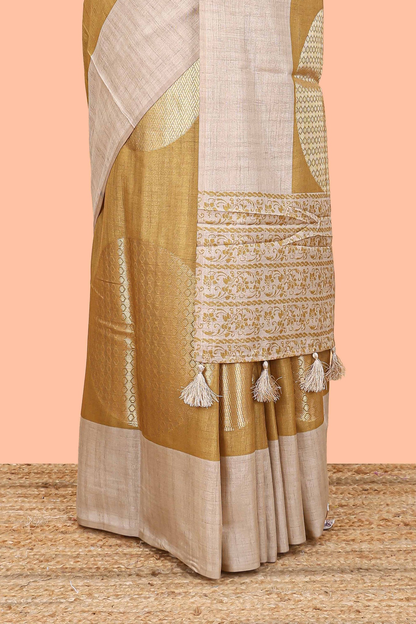 Mustard art tussar saree with large circular zari buttas and contrast cream floral pallu