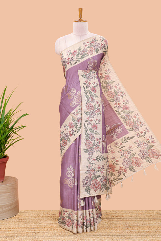 Lavender art tussar silk saree with rich floral zari butta weave and cream floral border and pallu