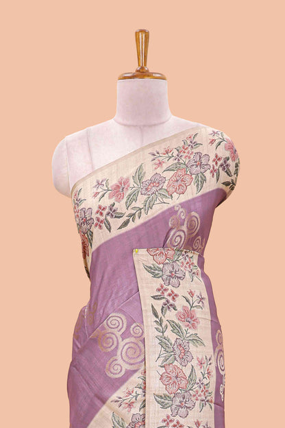 Lavender art tussar silk saree with rich floral zari butta weave and cream floral border and pallu