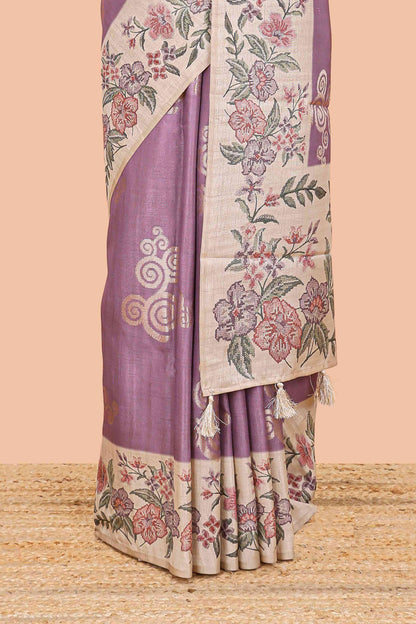 Lavender art tussar silk saree with rich floral zari butta weave and cream floral border and pallu