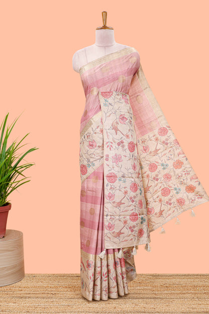 Pink art tussar saree featuring round zari butta body with floral and bird motif printed border and pallu