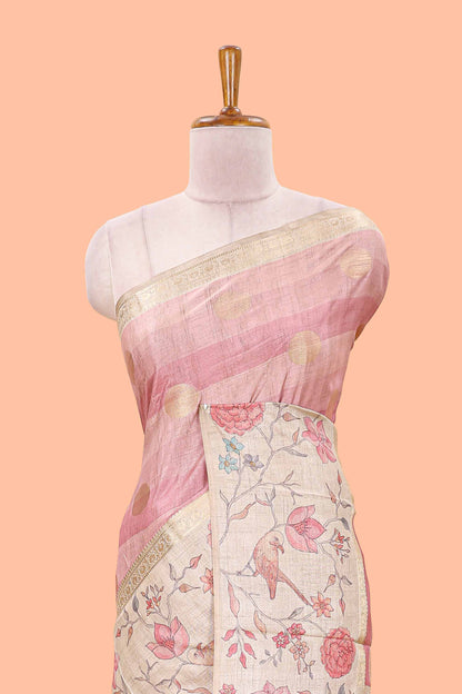 Pink art tussar saree featuring round zari butta body with floral and bird motif printed border and pallu