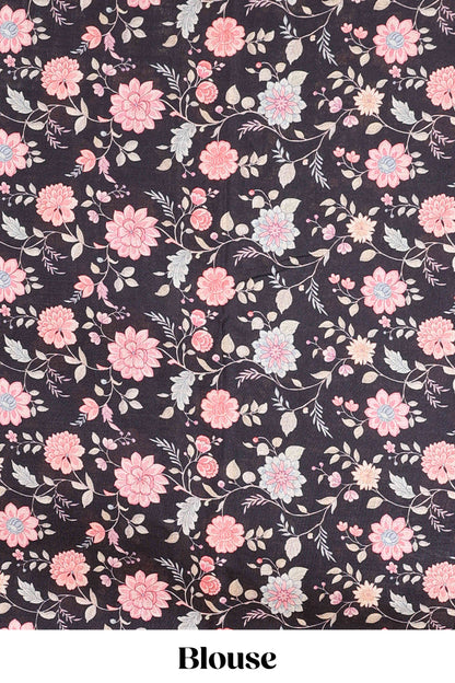 Peach art tussar saree with wave zari weaving body and black floral print border and pallu