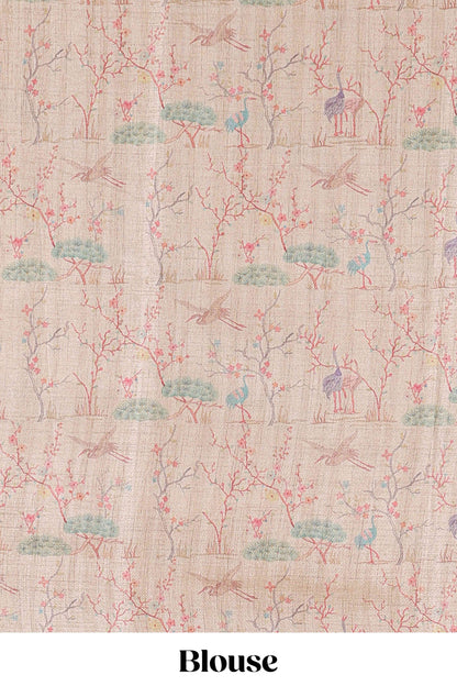 Green art tussar saree with wave zari weaving body and cream nature print border & pallu