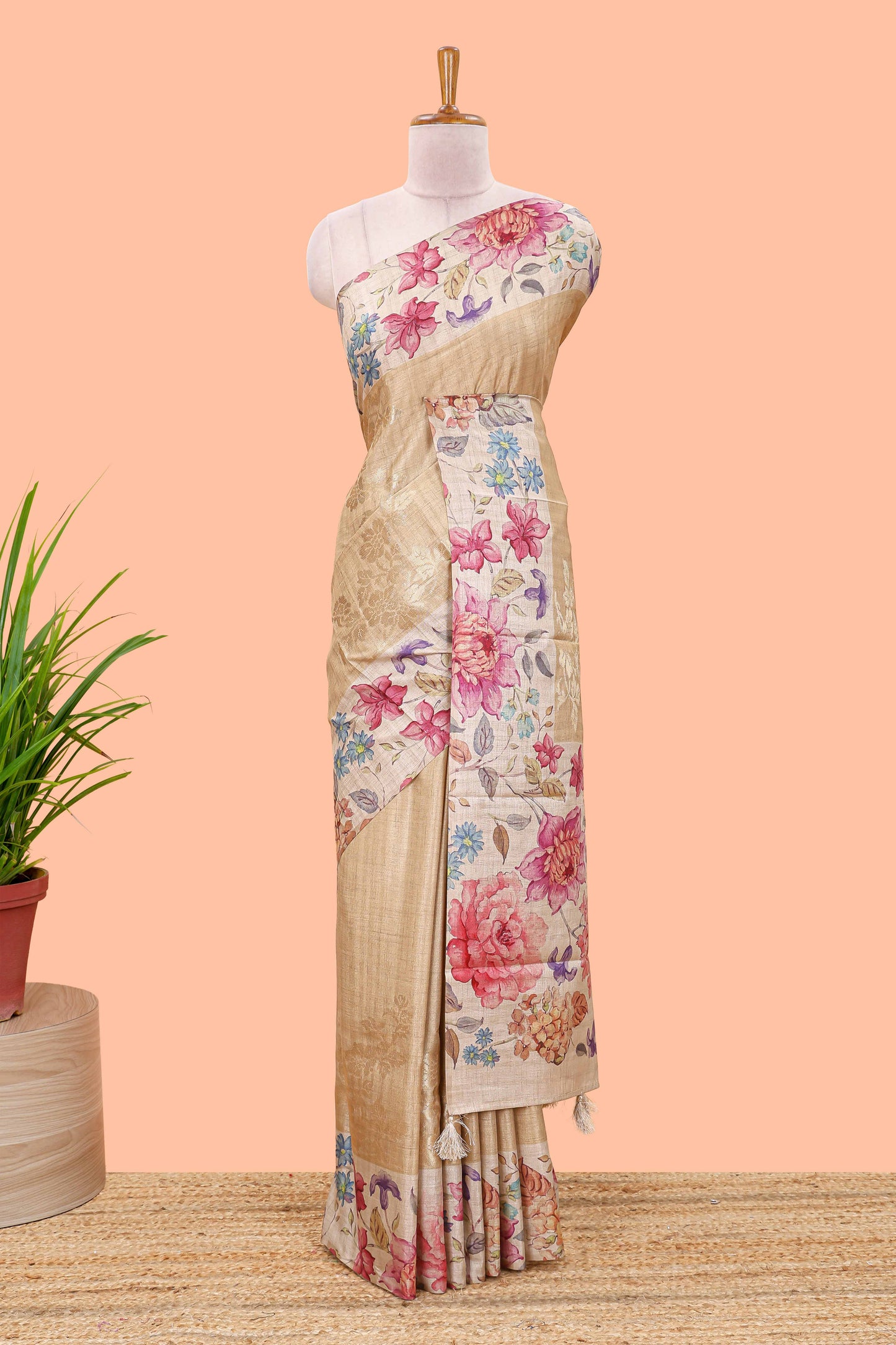 Sandal art tussar silk saree with floral zari butta body, cream border and floral print pallu