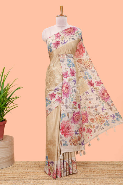 Sandal art tussar silk saree with floral zari butta body, cream border and floral print pallu