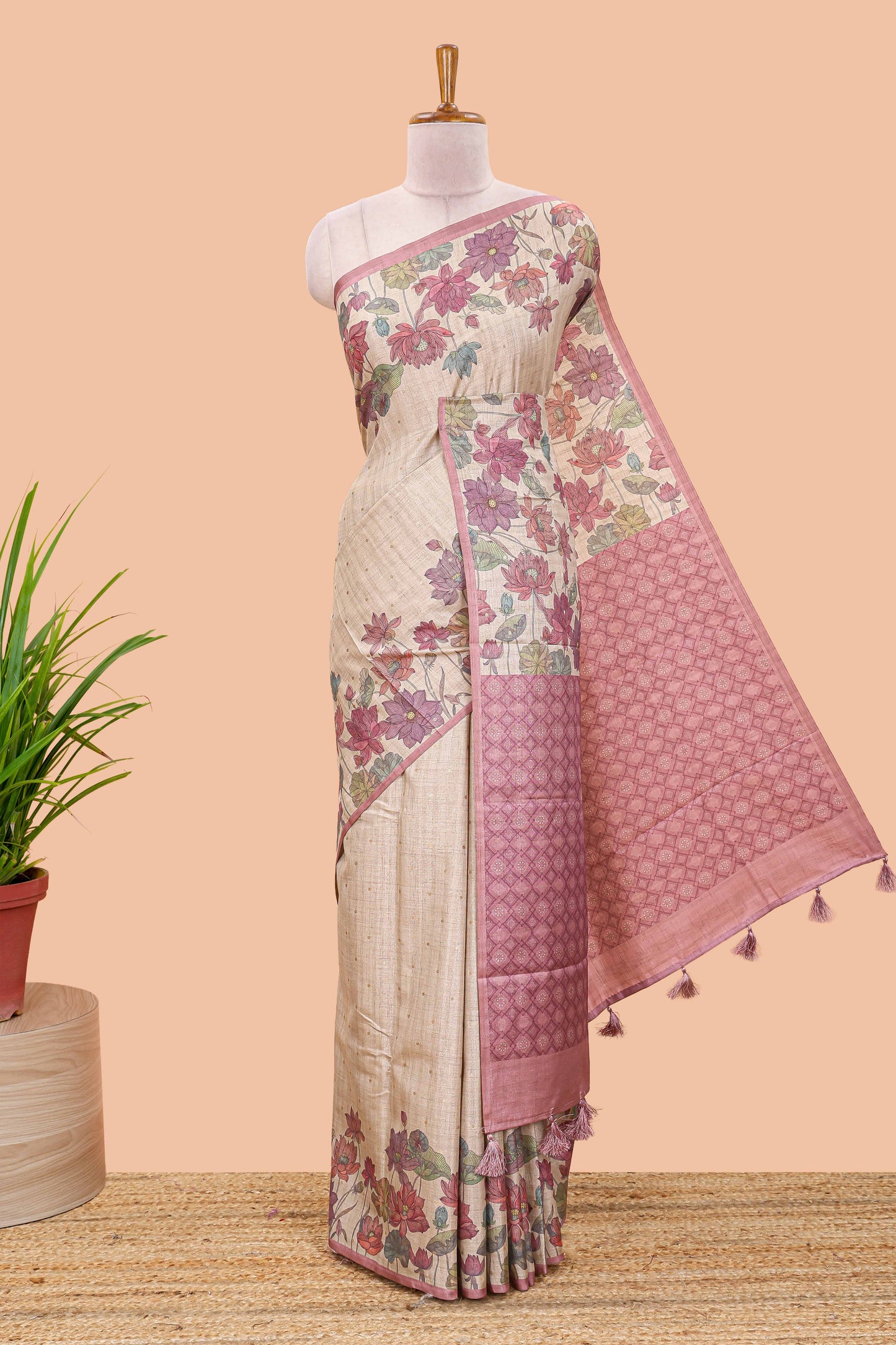 Beige art tussar silk saree with small zari butta weaving and floral print border and pallu