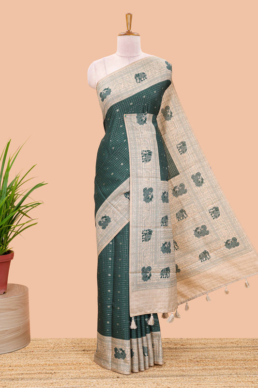 Green art tussar saree with zari check and butta weave, cream border and kalamkari elephant and peacock motif border and pallu