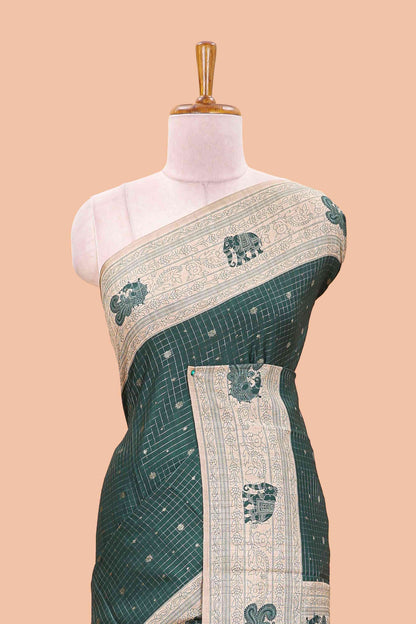 Green art tussar saree with zari check and butta weave, cream border and kalamkari elephant and peacock motif border and pallu