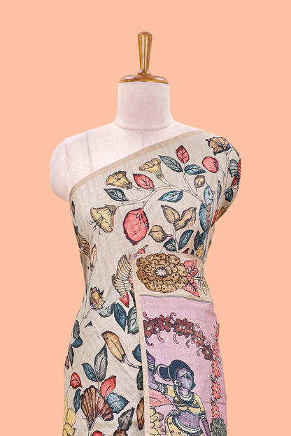 Borderless beige art tussar saree with tree, bird motifs and dancing girl printed pallu