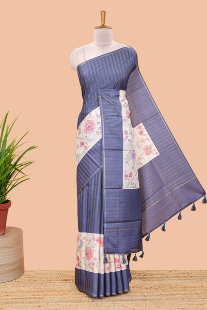 Blue art tussar silk saree  zari stripes, cream border and digital floral printed pallu