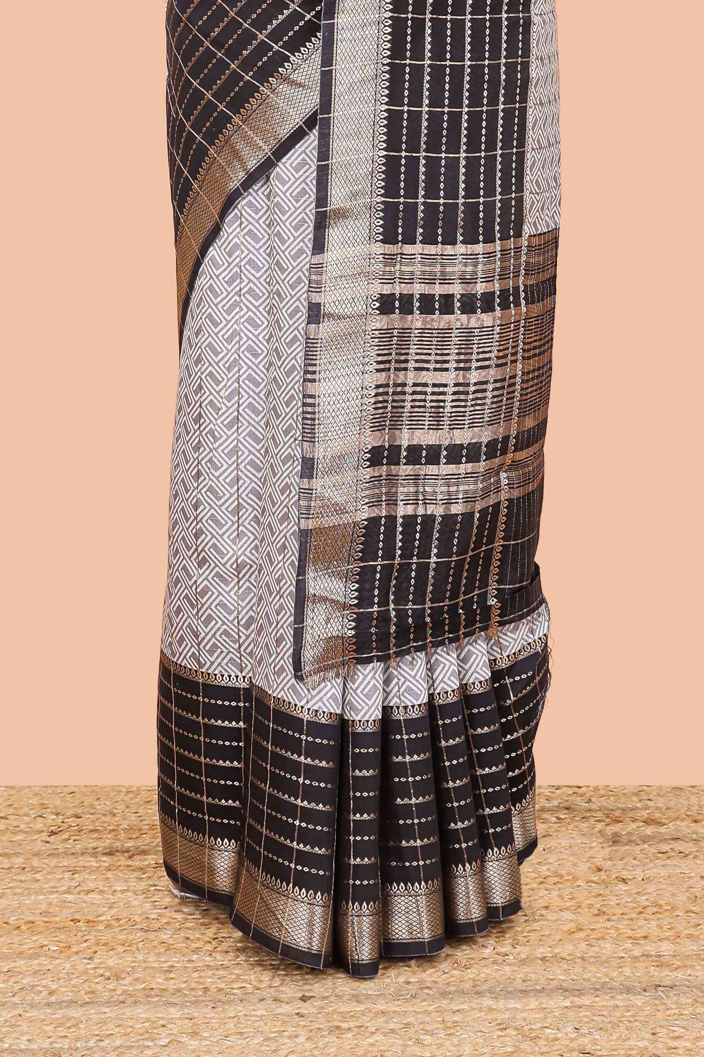 Grey assam silk saree with geometric print, contrast border with zari checks, and Pallu