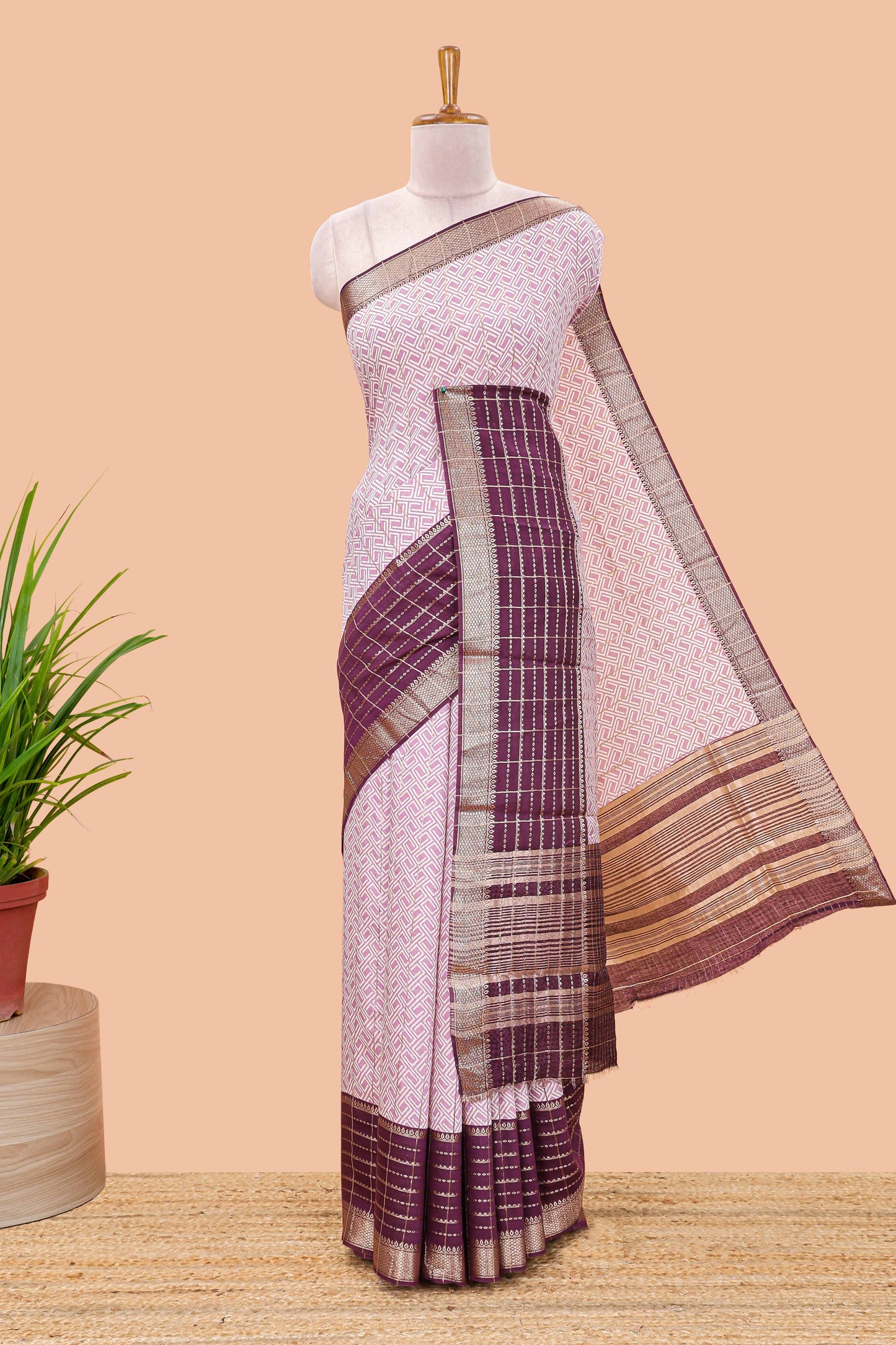 Purple assam silk saree with geometric print, contrast border with zari checks, and Pallu