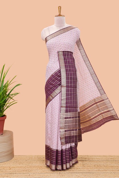 Purple assam silk saree with geometric print, contrast border with zari checks, and Pallu