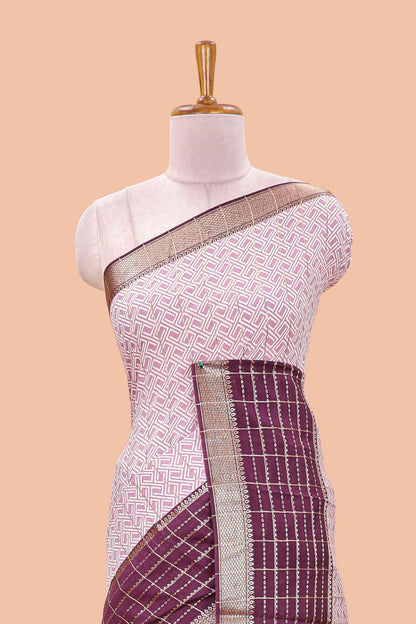 Purple assam silk saree with geometric print, contrast border with zari checks, and Pallu