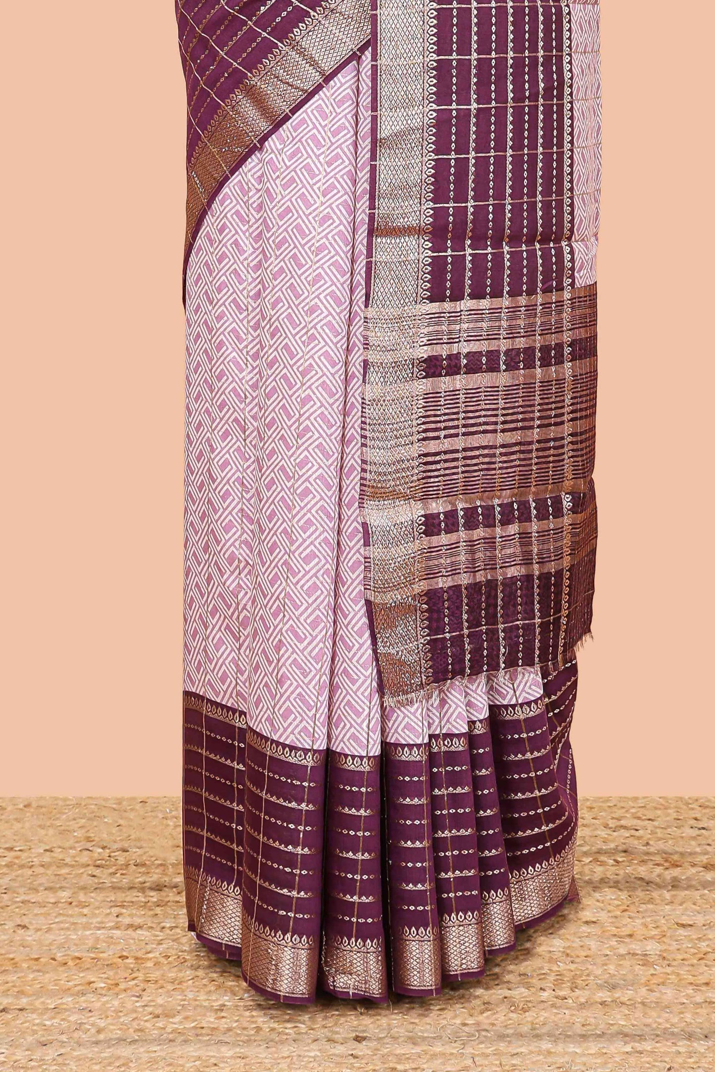 Purple assam silk saree with geometric print, contrast border with zari checks, and Pallu