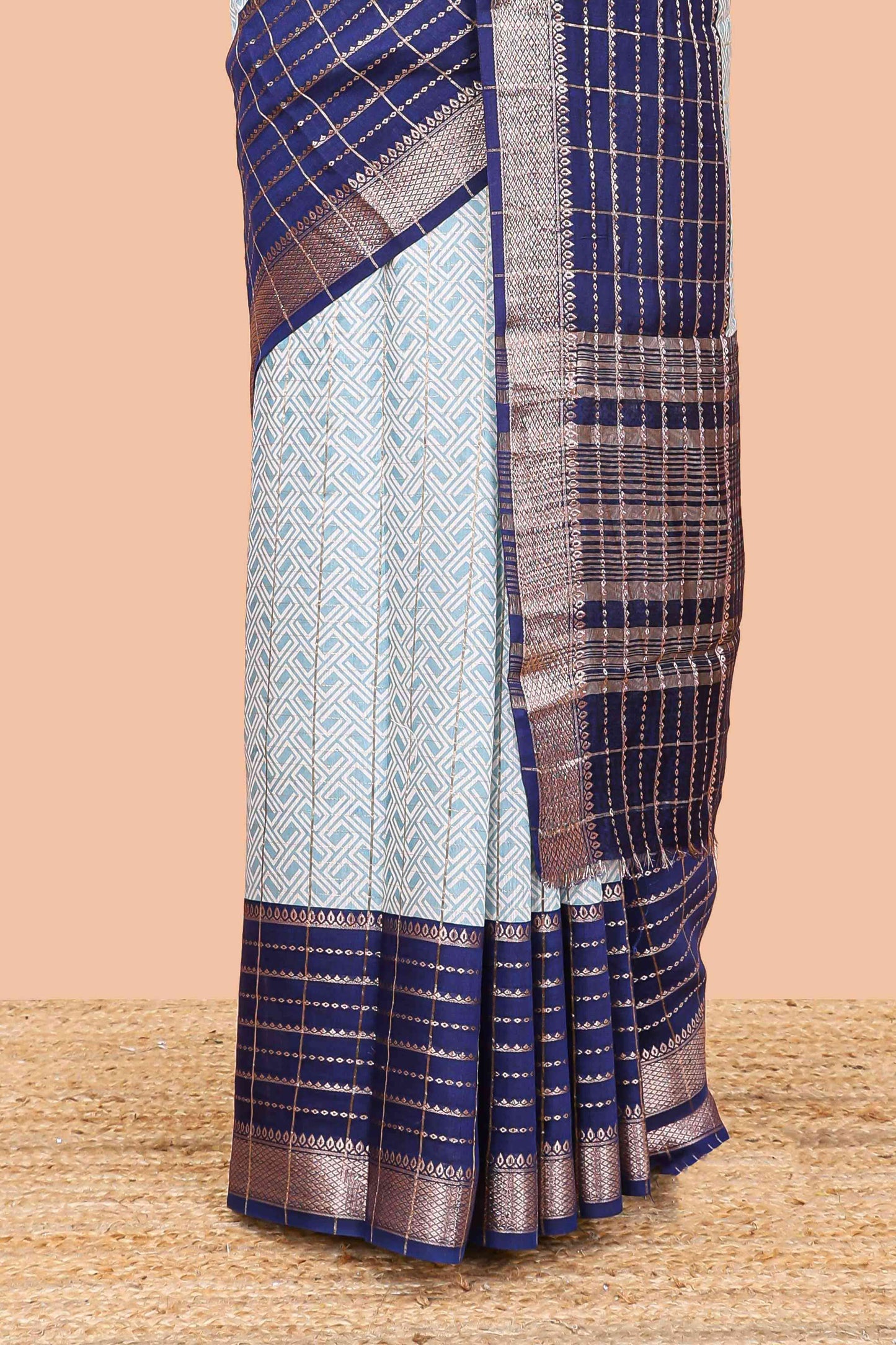 Turquiose blue assam silk saree with geometric print, contrast border with zari checks, and Pallu