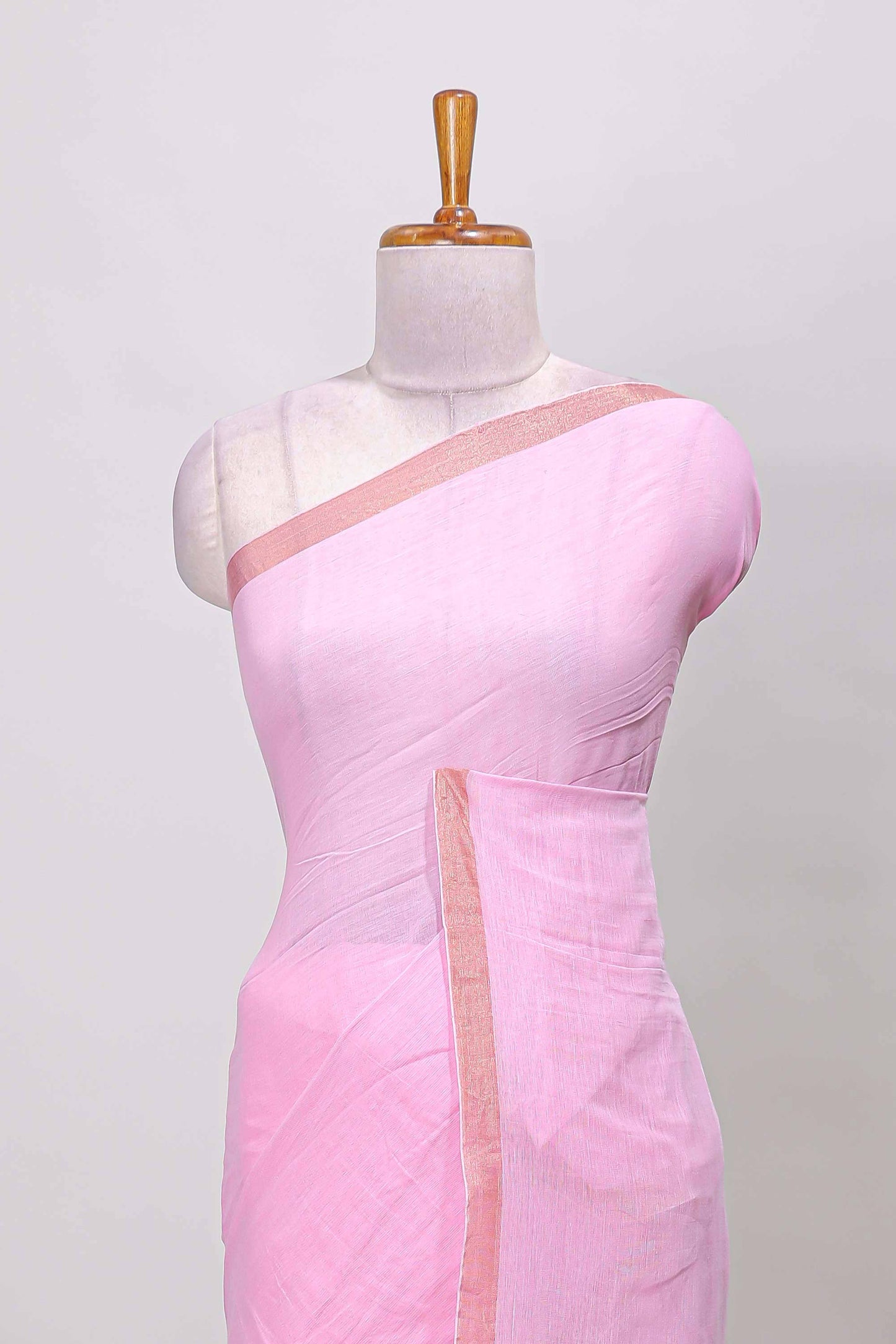 Pink plain south cotton saree with zari border and pallu