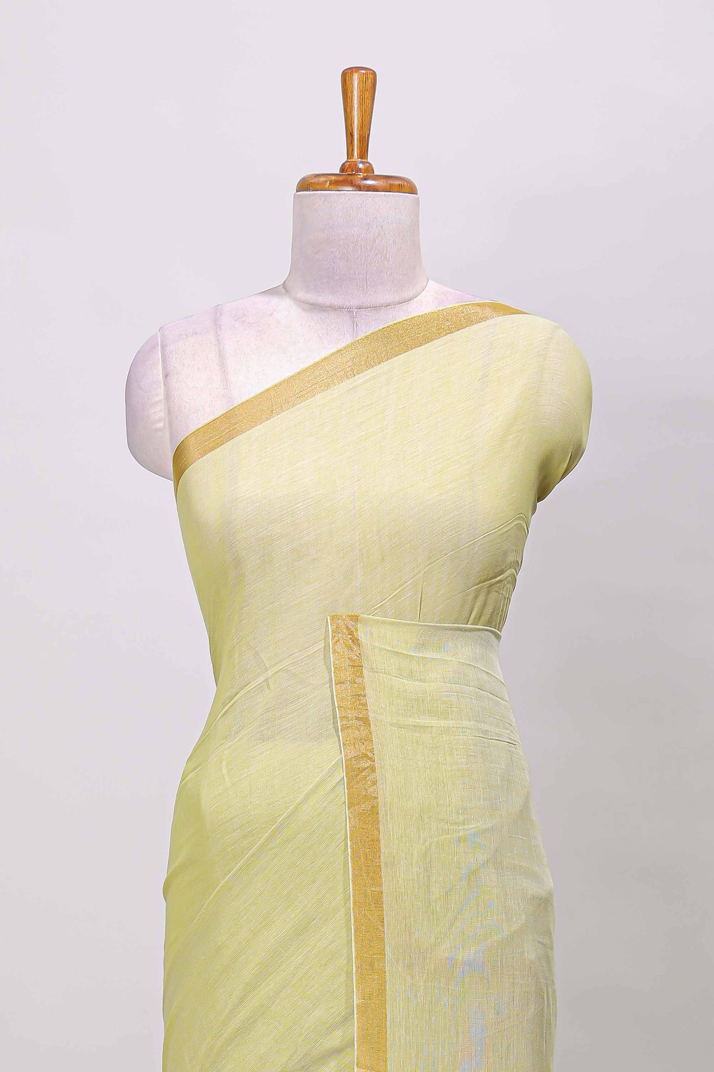 Green plain south cotton saree with zari border and pallu