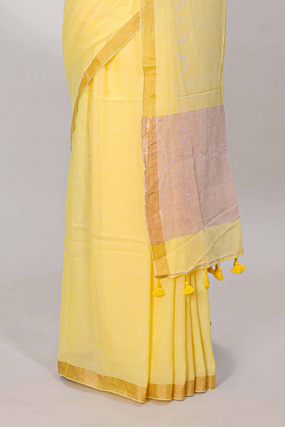 Yellow plain south cotton saree with zari border and pallu