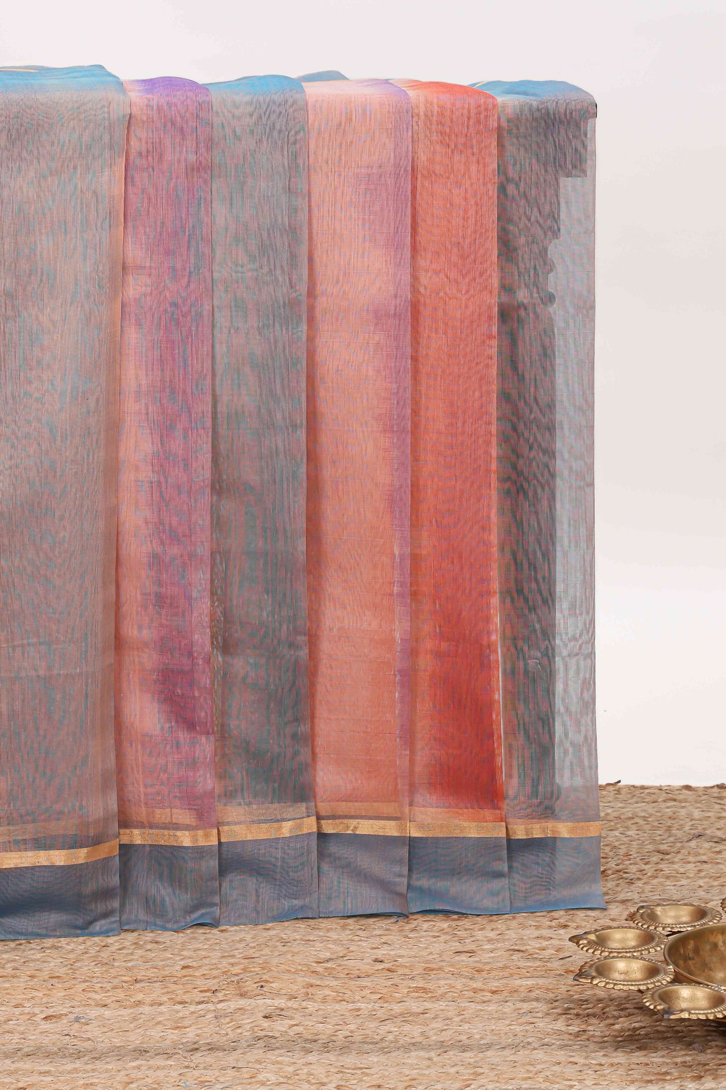 Multi color plain ikkat cotton saree with self border and zari striped pallu