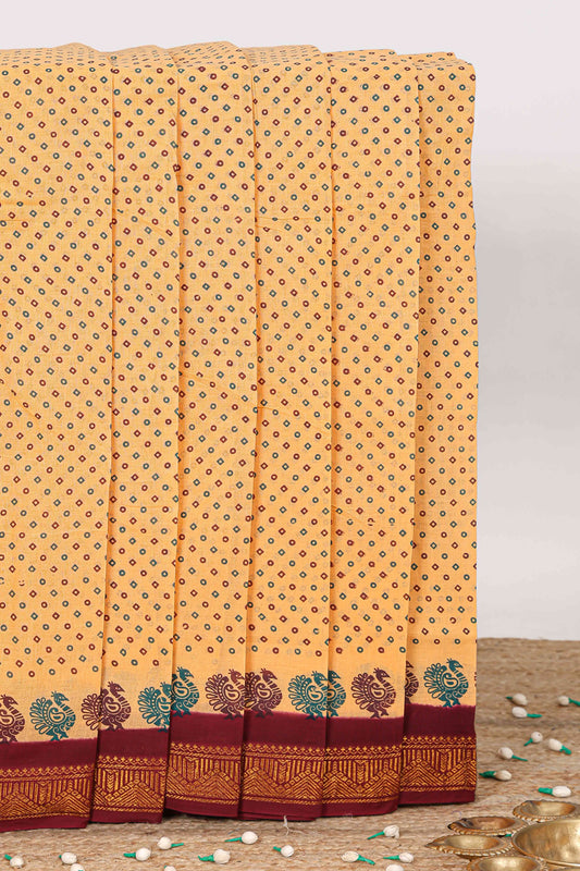 Sandal geometric butta and bottom mayil design sungudi cotton saree with contrast zari border and striped pallu