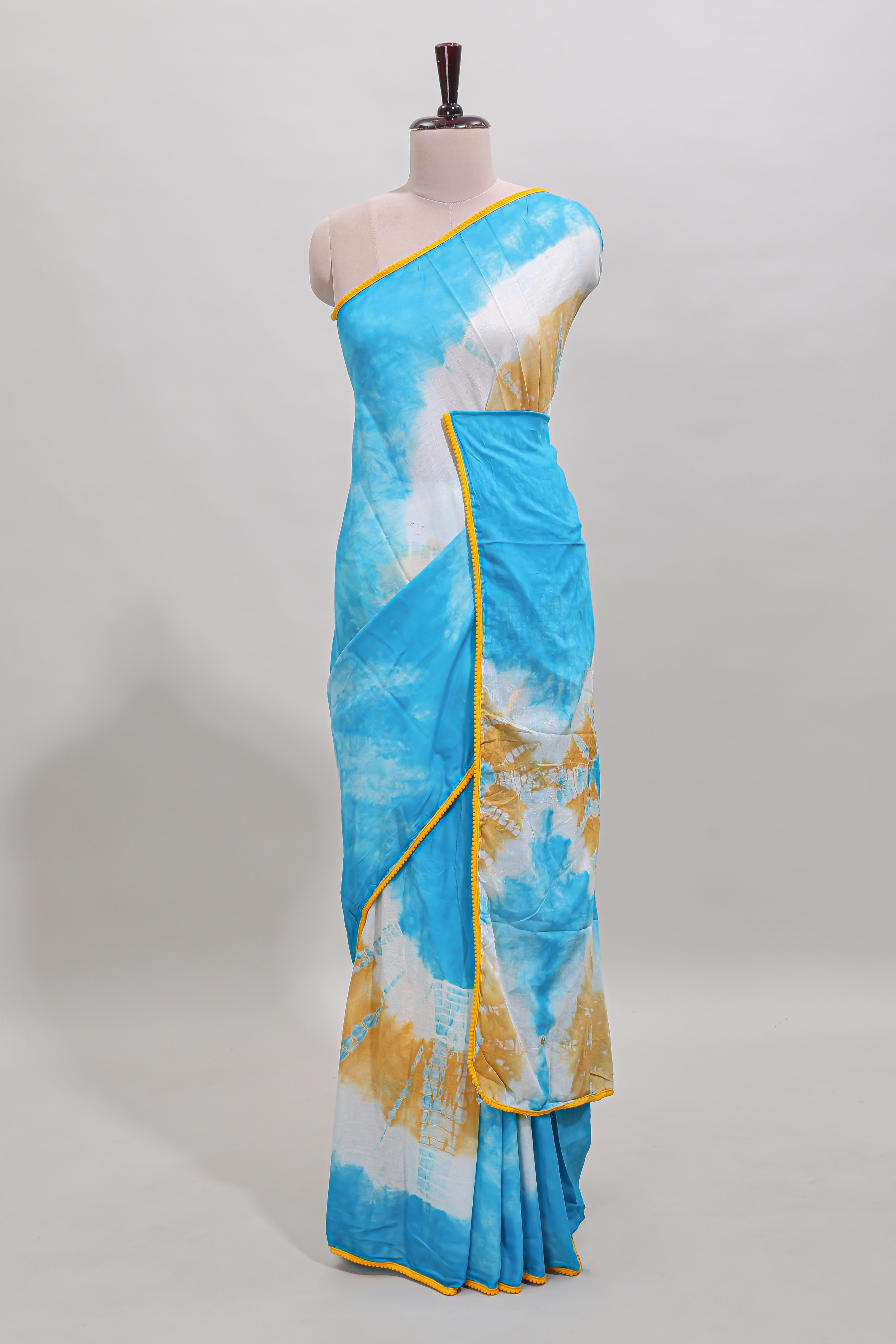 Blue shibori printed mul mul cotton saree with contrast scallop border and blouse