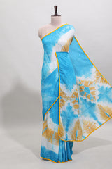 Blue shibori printed mul mul cotton saree with contrast scallop border and blouse