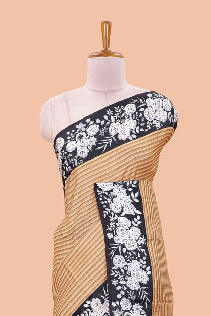 Orange linen cotton saree with all-over stripe print and black satin border with floral print pallu