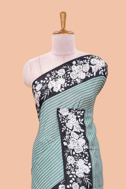 Green linen cotton saree with all-over stripe print and black satin border with floral print pallu